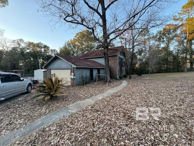 view of property exterior with brick siding