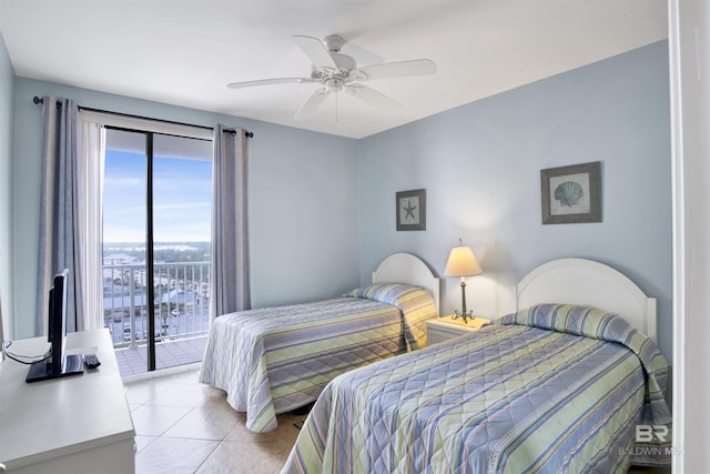 bedroom featuring access to exterior, light tile patterned flooring, and ceiling fan