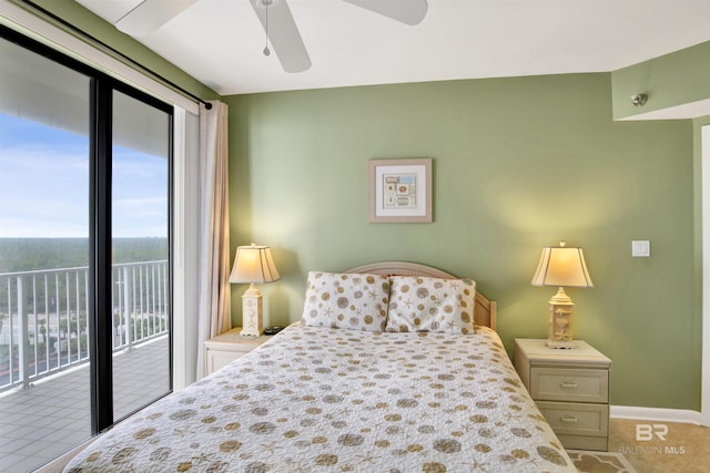 bedroom with access to exterior, ceiling fan, and baseboards