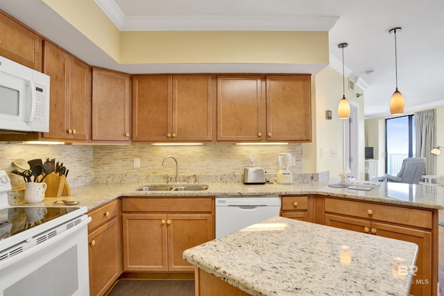 kitchen with white appliances, backsplash, a sink, and crown molding