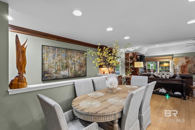 dining room featuring crown molding, recessed lighting, a ceiling fan, and light wood finished floors
