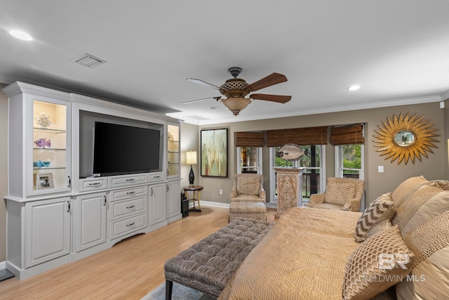 bedroom featuring visible vents, crown molding, ceiling fan, access to outside, and light wood-style flooring
