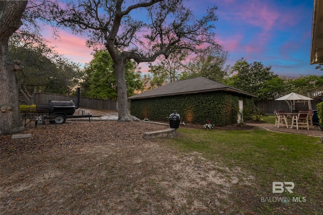 yard at dusk with fence