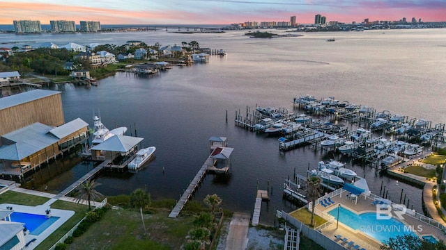 birds eye view of property featuring a water view