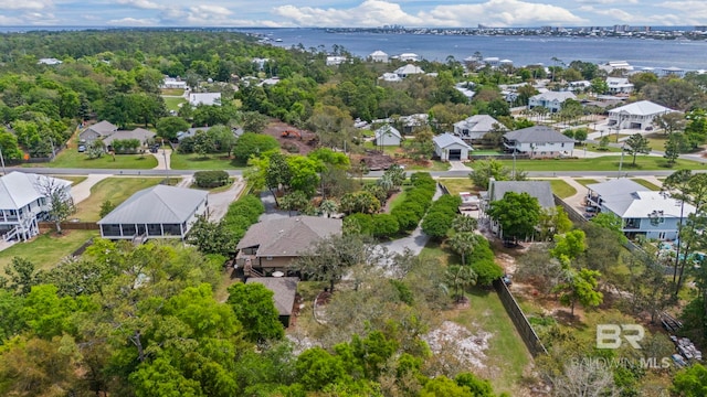 aerial view featuring a residential view and a water view