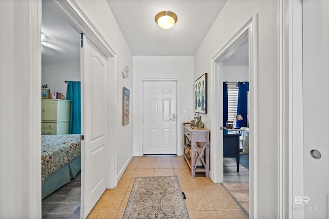 entryway featuring light tile patterned floors