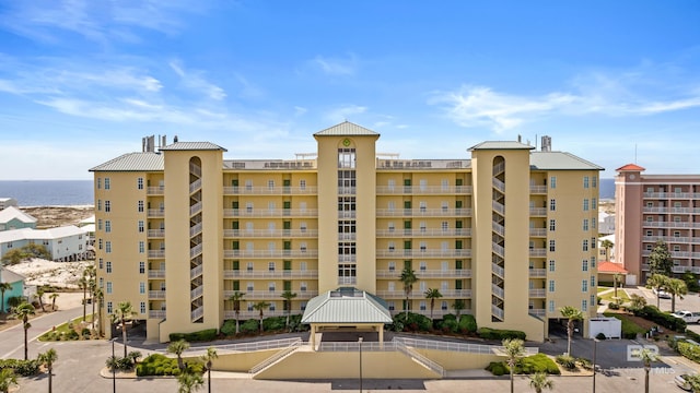 view of property with a water view