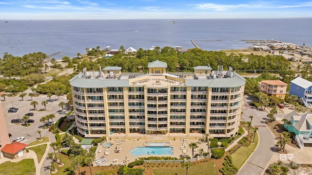 birds eye view of property featuring a water view