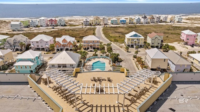 aerial view featuring a water view and a residential view