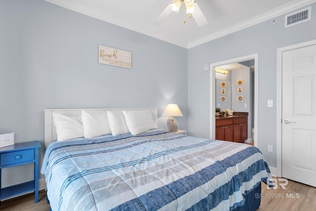 bedroom with baseboards, visible vents, ceiling fan, ornamental molding, and wood finished floors