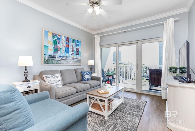 living area featuring ceiling fan, crown molding, and wood finished floors