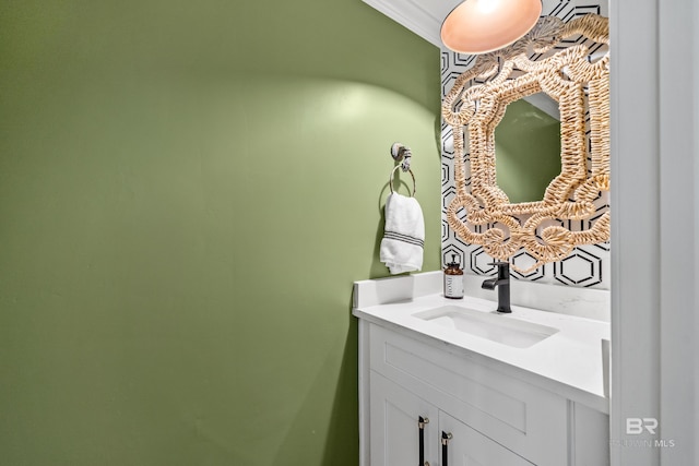 bathroom with vanity and crown molding