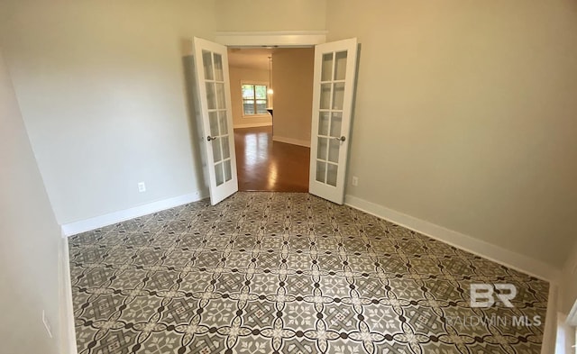 spare room with french doors