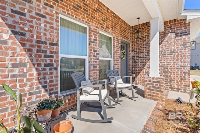 view of patio featuring a porch