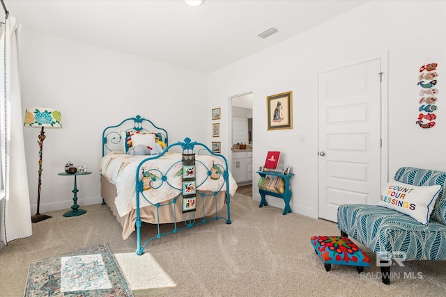 bedroom featuring carpet floors, baseboards, and visible vents