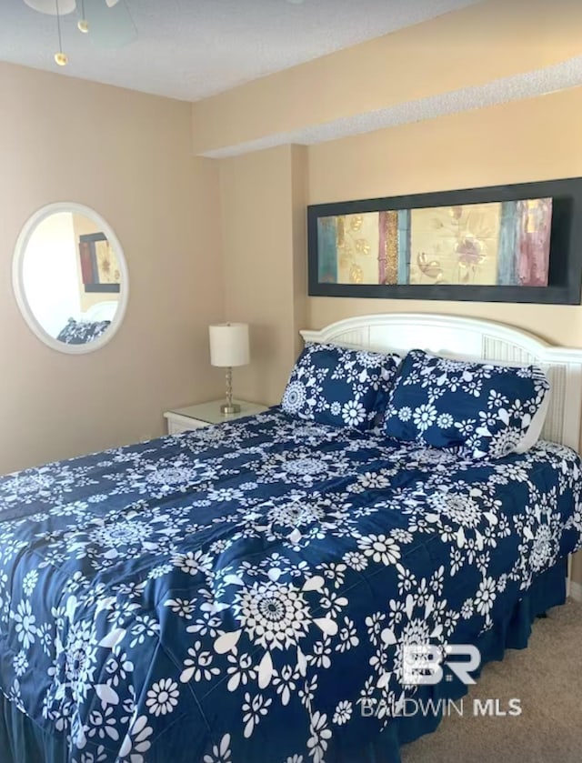 bedroom featuring carpet floors and ceiling fan