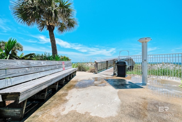 view of patio with a water view