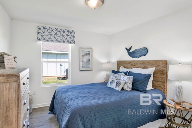 bedroom with hardwood / wood-style flooring