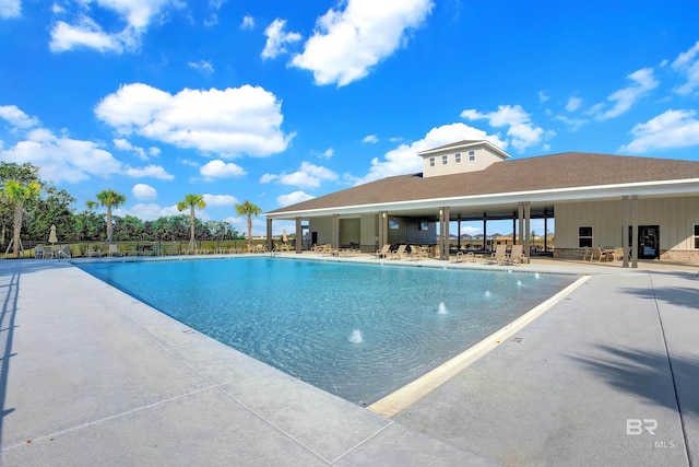 view of pool featuring a patio