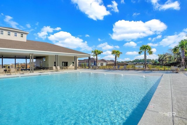 view of swimming pool with a patio