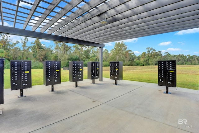 view of patio featuring a mail area