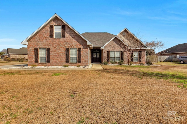 view of front of property with a front lawn