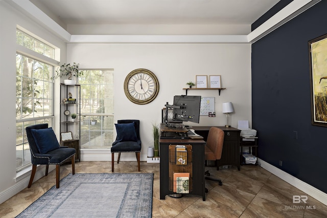 office space featuring baseboards