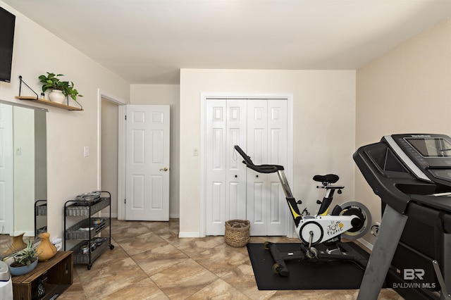 exercise area with baseboards