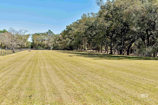 view of yard featuring fence