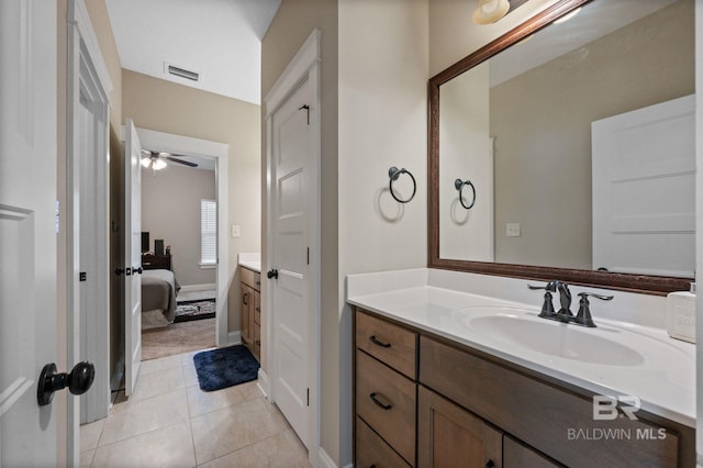 bathroom featuring tile patterned floors and vanity