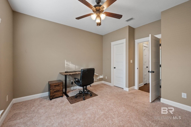 office area with light colored carpet and ceiling fan