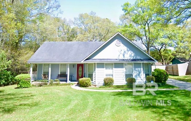 view of front of home featuring a porch and a front lawn