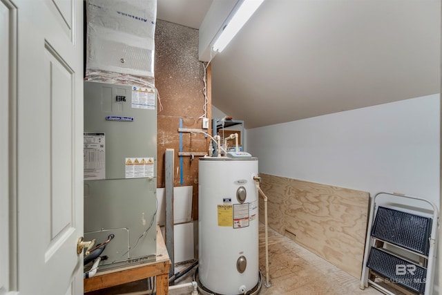 utility room with heating unit and water heater