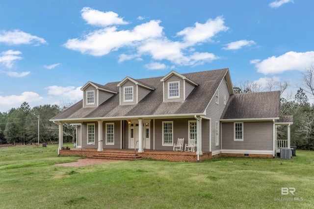 new england style home with covered porch, central AC, roof with shingles, crawl space, and a front lawn