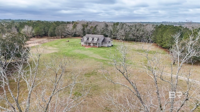 bird's eye view featuring a view of trees