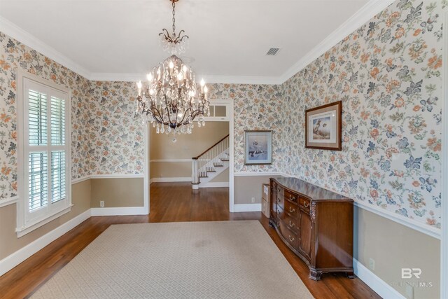 dining area with wallpapered walls, baseboards, visible vents, dark wood-style flooring, and stairs
