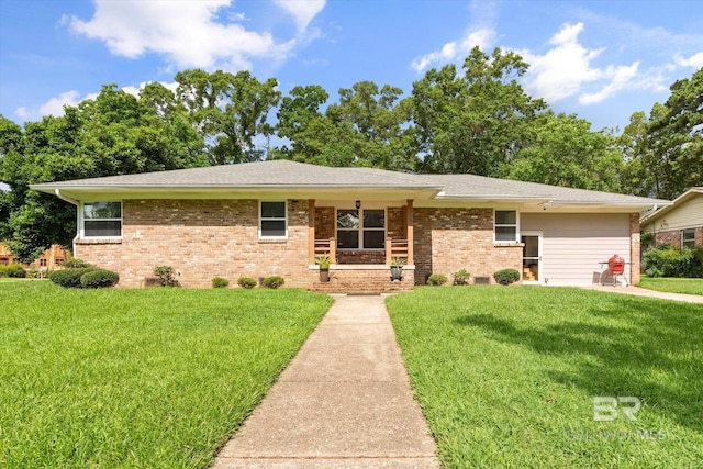 42 W Lourando Dr, Mobile, AL 36606 - view of front facade with a front lawn, brick siding, and a shingled roof