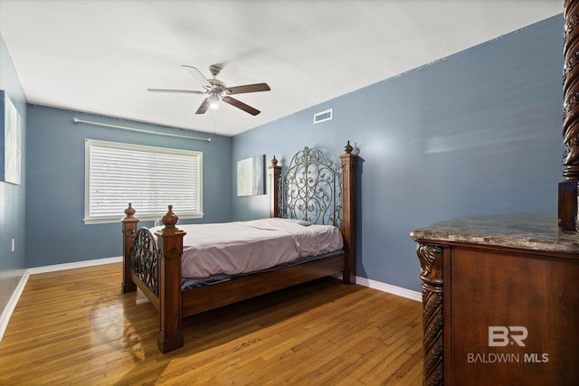 42 W Lourando Dr, Mobile, AL 36606 - bedroom featuring hardwood / wood-style flooring and a ceiling fan