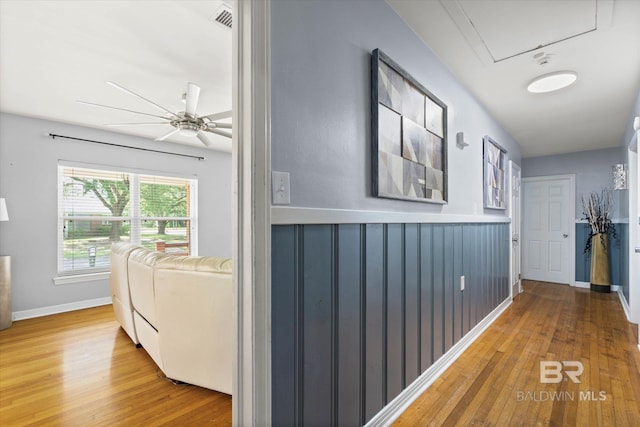 42 W Lourando Dr, Mobile, AL 36606 - hall featuring hardwood / wood-style flooring, wainscoting, and attic access