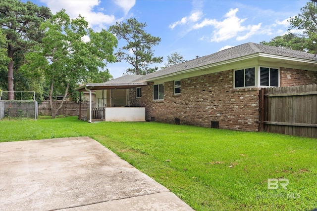 42 W Lourando Dr, Mobile, AL 36606 - fenced backyard with a patio