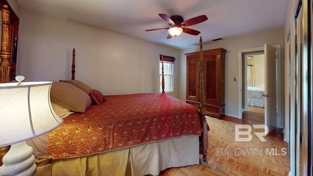 bedroom featuring ceiling fan and light parquet floors