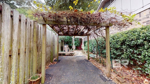 view of patio featuring gas water heater