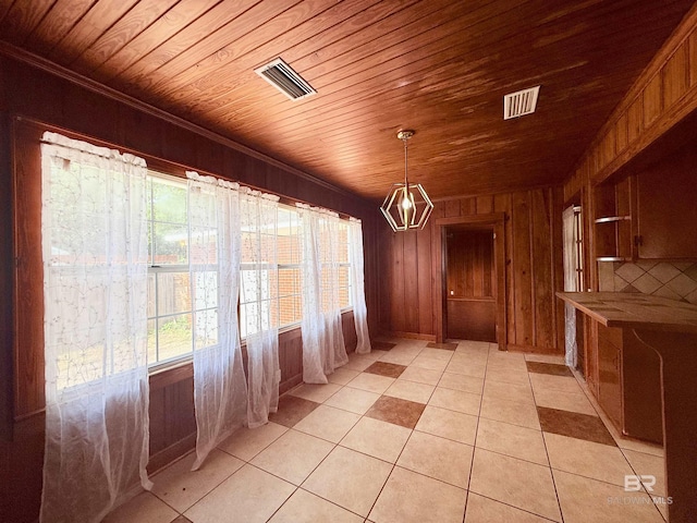 613 S Carney St, Atmore, AL 36502 - interior space featuring wooden ceiling, wood walls, light tile patterned floors, and crown molding