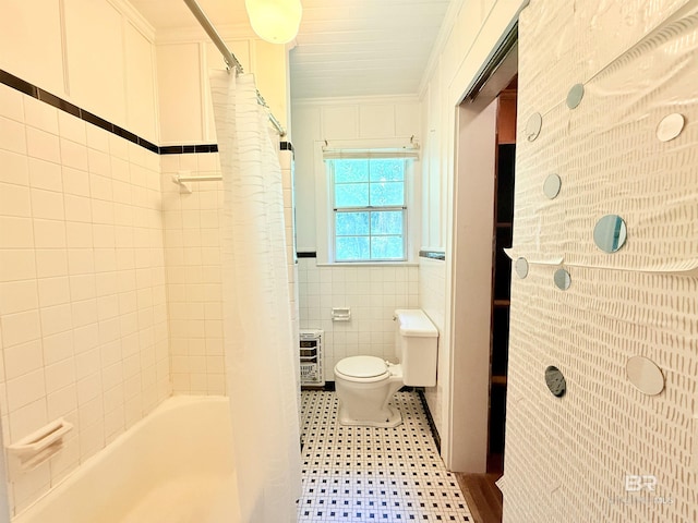 613 S Carney St, Atmore, AL 36502 - full bathroom featuring tile walls, shower / tub combo with curtain, and heating unit