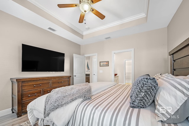 26635 Terry Cove Dr, Orange Beach, AL 36561 - bedroom with visible vents, a raised ceiling, and ornamental molding