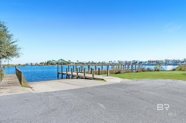 26635 Terry Cove Dr, Orange Beach, AL 36561 - view of dock featuring a water view