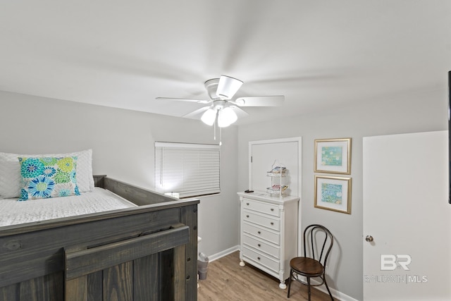 bedroom with baseboards, light wood finished floors, and ceiling fan