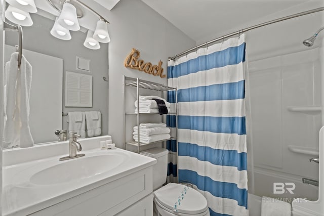 bathroom with shower / tub combo with curtain, toilet, and vanity