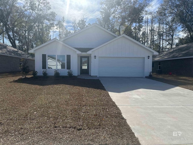 single story home with an attached garage, driveway, and board and batten siding