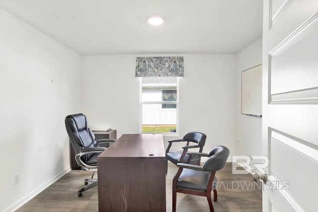 office with wood finished floors and baseboards